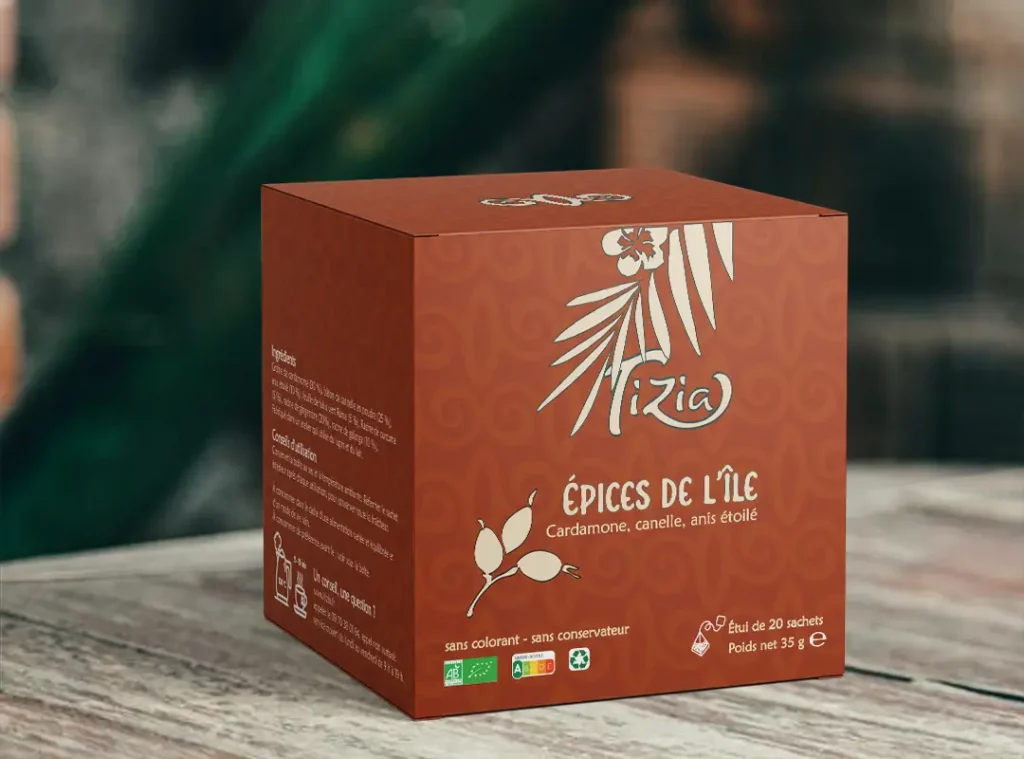 boîte de tisanes posée sur table en bois avec le logo de Tizia et le titre « épices de l'île"